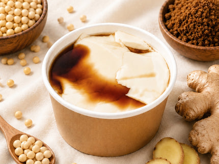 Warm silken tofu with ginger infused brown sugar syrup